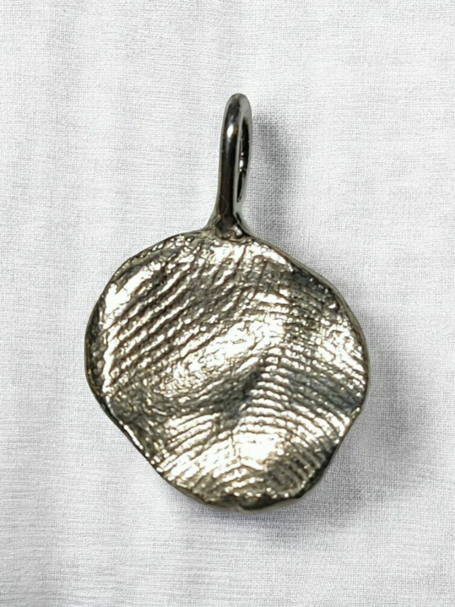 Gyvūno ir žmogaus atspaudo pakabuko rinkinys